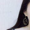 Image of Abstract Face Dangle Earrings